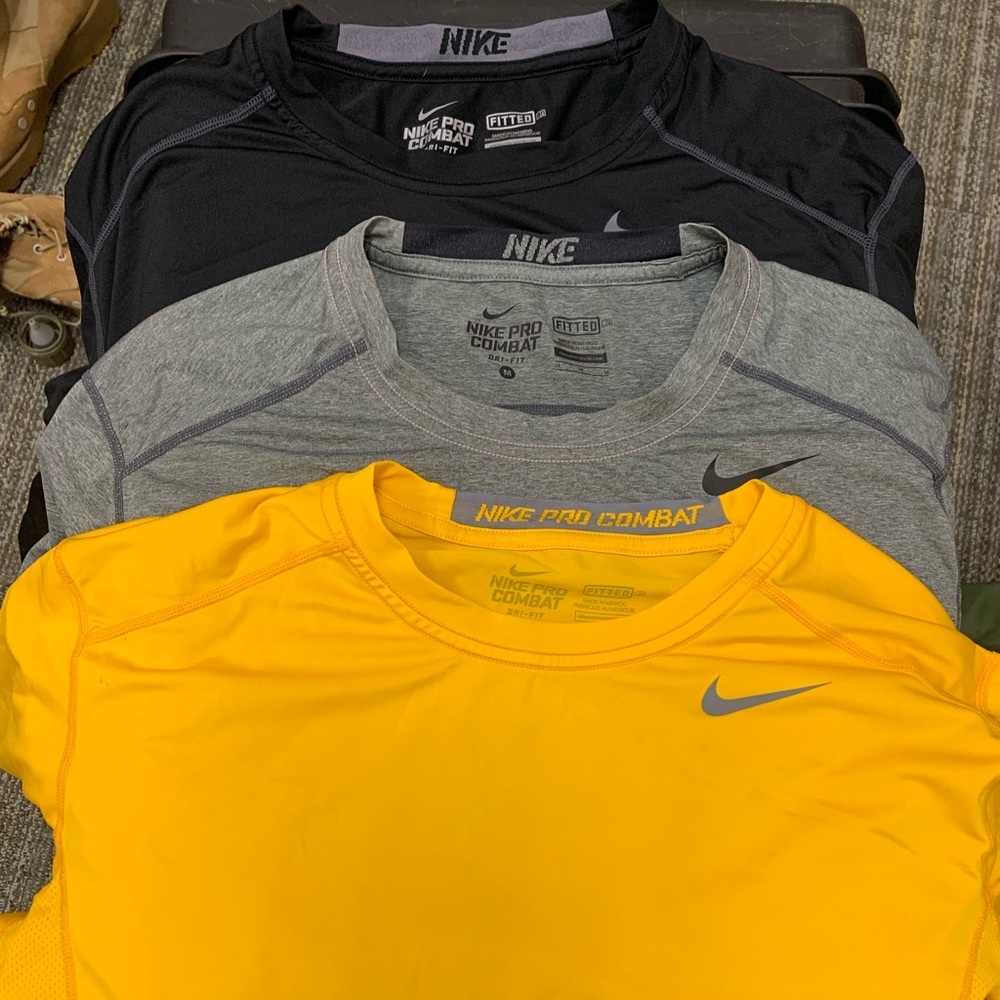 Nike pro combat shirts size M.